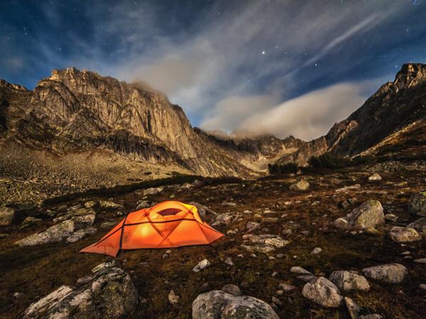 Camping under starry sky